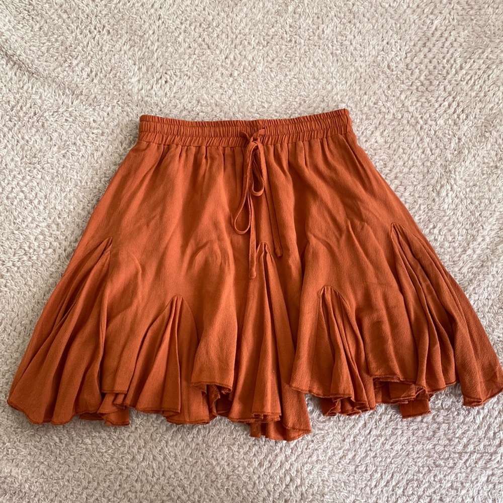 Molly Green size small, terra-cotta skirt